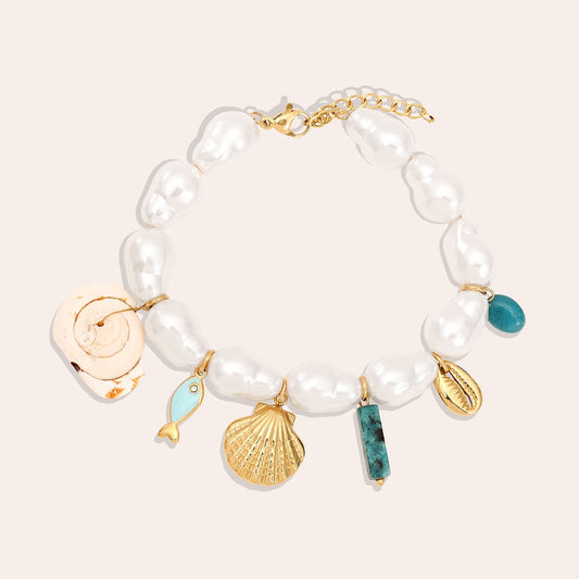 Filigranes Armband mit Meer-Details und Perle – inspiriert vom Ozean für deinen sommerlichen Look