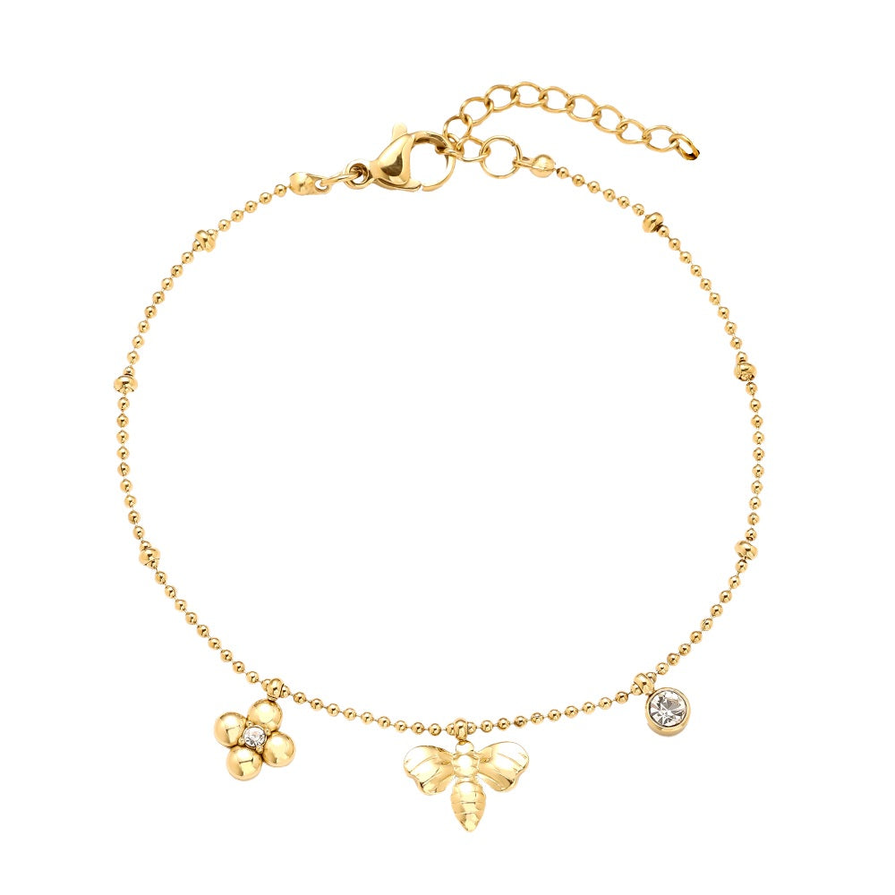 Das Bee & Flower Armband kombiniert florale Elemente mit einer Biene für einen verspielten und eleganten Look.