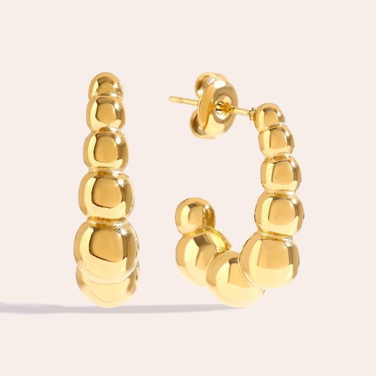 Elegante Bubbles Ohrstecker – einzigartige Ohrstecker mit einem charmanten, kugelförmigen Design.