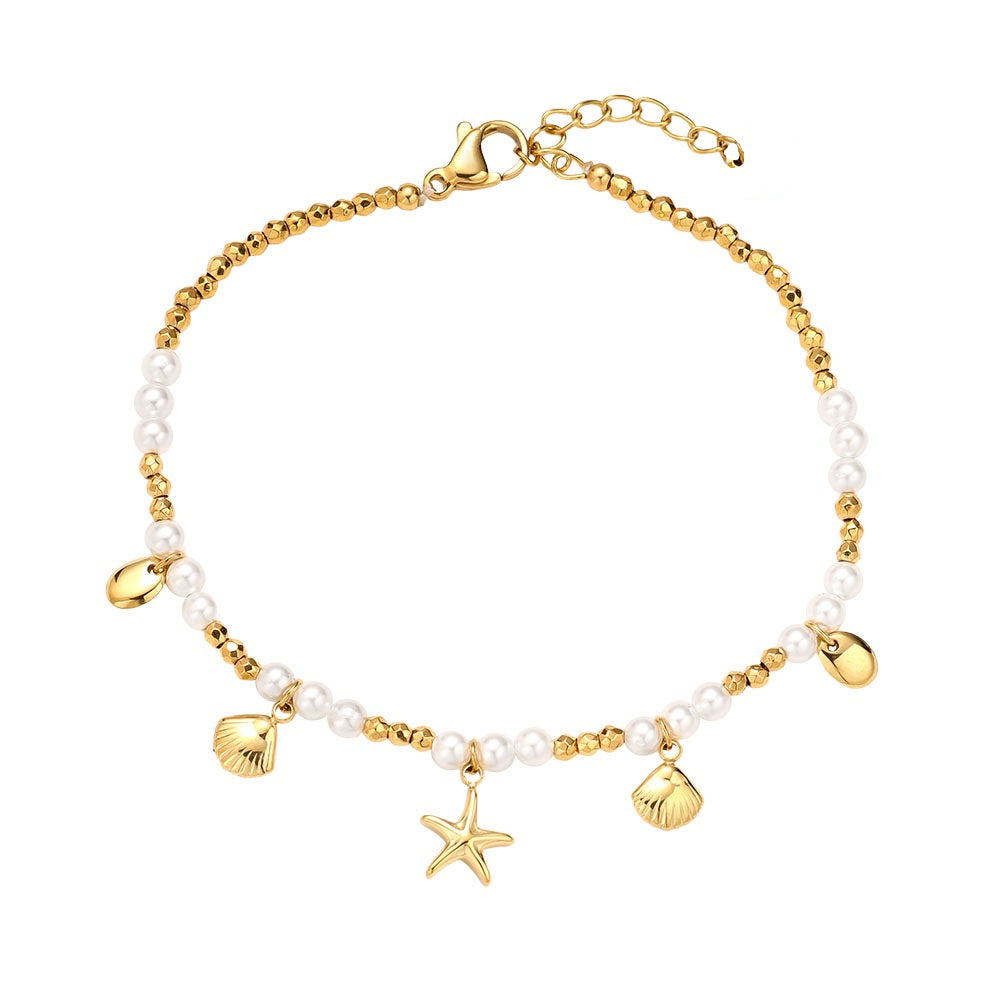 Elegantes Ocean and Pearl Armband mit zarten Perlen und maritimem Design. Perfekt für einen stilvollen Look.