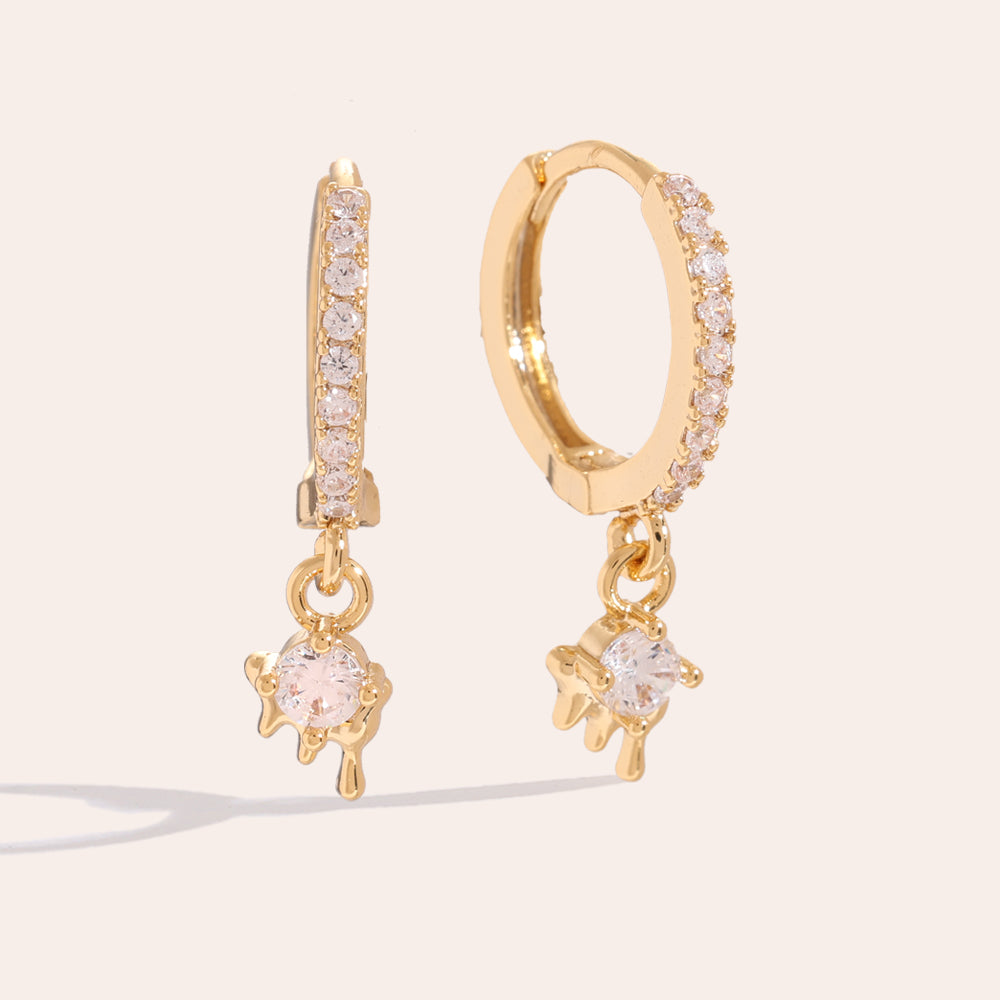 Stilvolle Melt Gloss Ohrringe, die deinem Outfit eine glänzende Note verleihen.